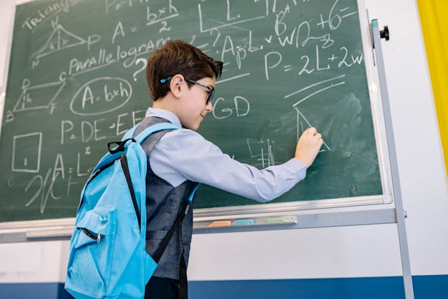 smart-boy-solving-a-math-problem